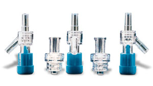Needle-free injection system is injection molded from transparent, lipid-resistant polycarbonate.